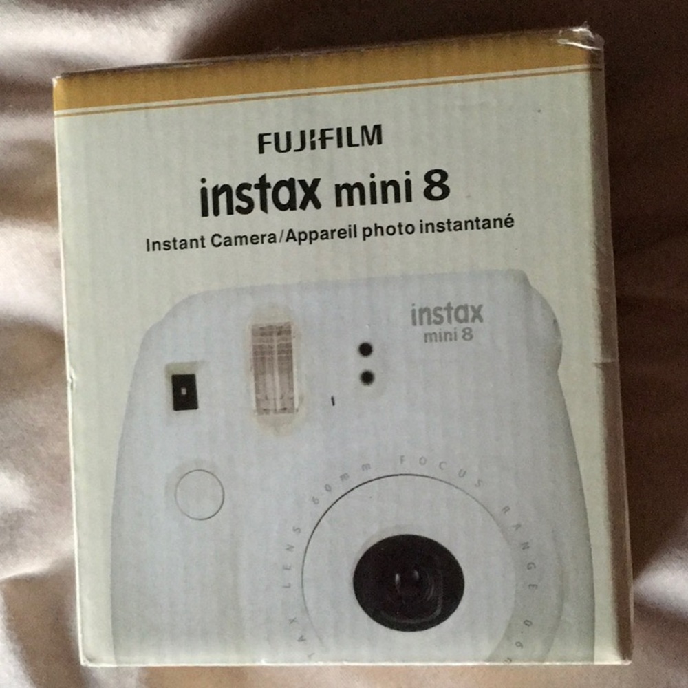 All white Polaroid camera with one box of film🤍🤍